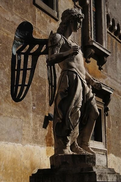 Archangel Michael, 1544. Statue by Raffaello da Montelupo (1