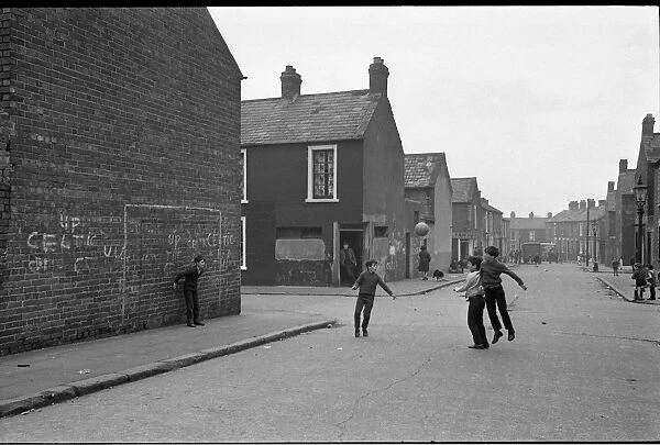 Boys playing football, Belfast, Northern Ireland