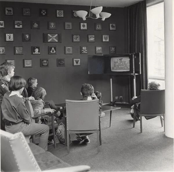 Cub Scouts watching TV at Baden Powell House, London