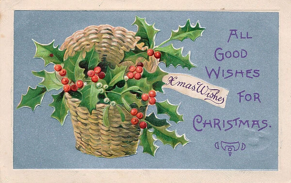 Holly and mistletoe in a basket on a Christmas postcard