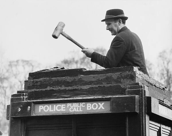 Man demolishing top of police public call box