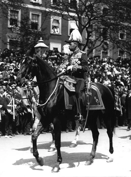 Portrait of King George V riding a horse