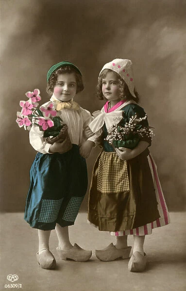 Postcard, Dutch boy and girl with flowers