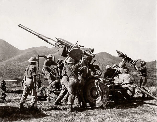 World War II WW2 - artillery gun in action