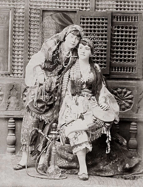 Two young Egyptian woman with hookah pipe, Egypt, c. 1880 s