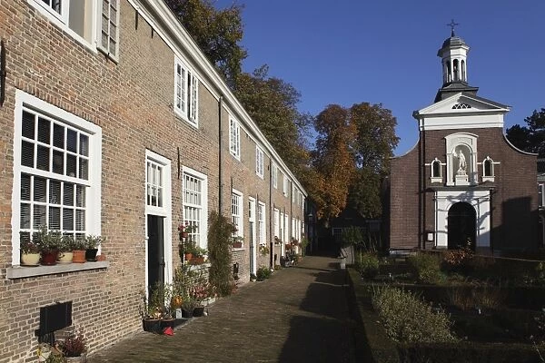 Chapel and brick housing within the courtyard of the Begijnhof (Beguinage) in Breda