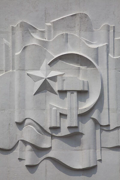 Hammer and Sickle emblem on the Ho Chi Minh Museum, Hanoi, Vietnam