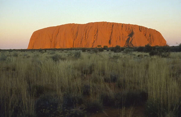 10001400. AUSTRALIA Northern Territory Uluru Ayers Rock at sunset