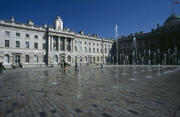 20019331. ENGLAND London Somerset House and courtyard with rows of fountains spouting high