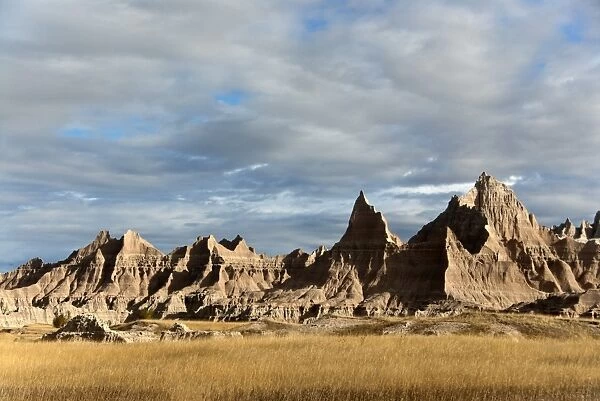 View of prairie and eroded rock formations, Badlands N. P. South Dakota, U. S. A. september