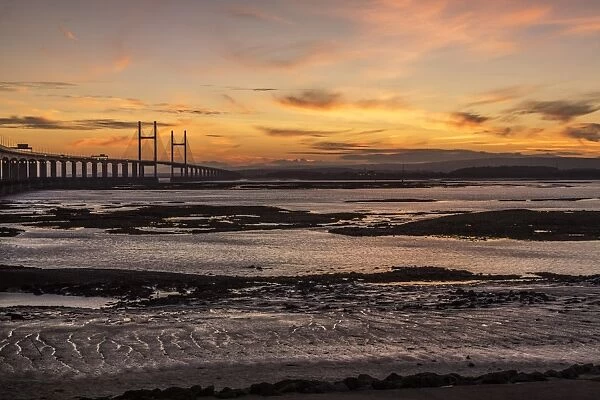 View of road bridge over river at sunset, viewed from Severn Beach, Second Severn Crossing, River Severn