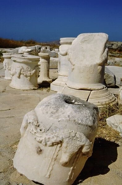 Greece, Aegean Sea, Delos. Greco-Roman ruins of columns along the Sacred Way