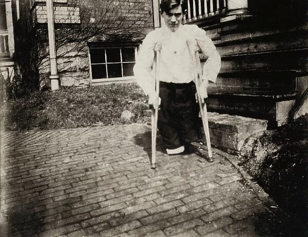 HINE: COAL MINER, 1910. A young miner whose legs were cut off by a motor car in