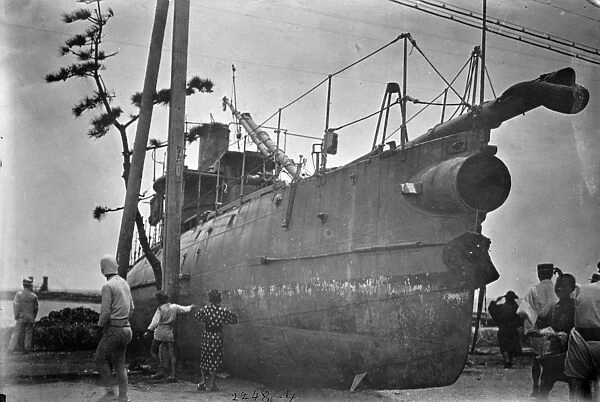 JAPAN: TYPHOON, c1911. Japanese torpedo boat driven ashore by a typhoon. Photograph