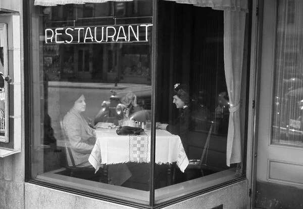 OHIO: DINER, 1936. Women having dinner in a restaurant in Jackson, Ohio