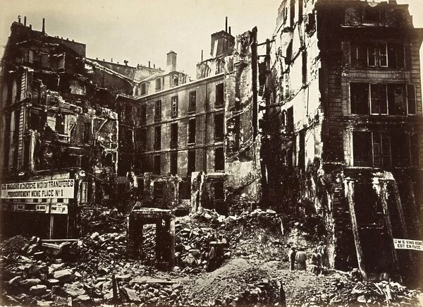 PARIS, 1872. Buildings on the Carrefour de la Croix-Rouge in Paris, France, damaged