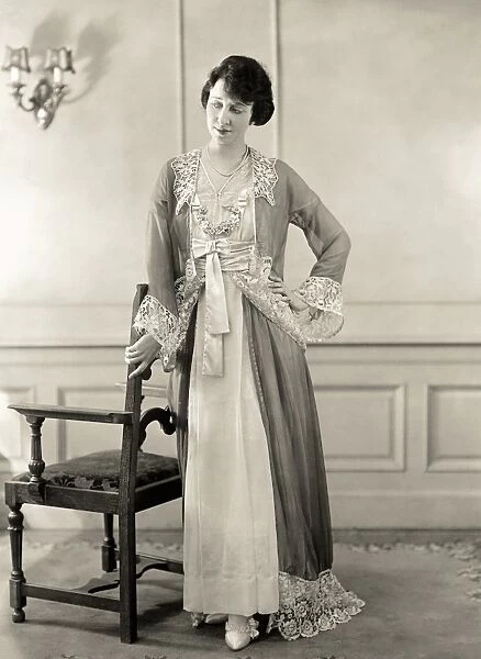 WOMENs FASHION, c1910. A New York actress photographed in a negligee, a costume