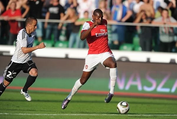 Jay Emmanuel Thomas Scores the Fifth Goal Past Srda Knezevic in Arsenal's Thrilling 5:6 Victory over Legia Warsaw