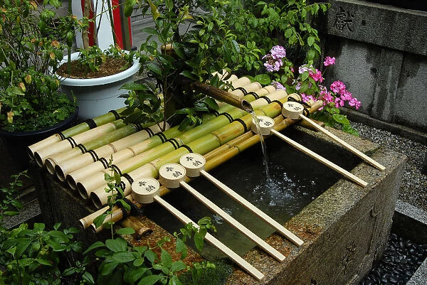 Ablution basin at the entrance of a shinto shrine