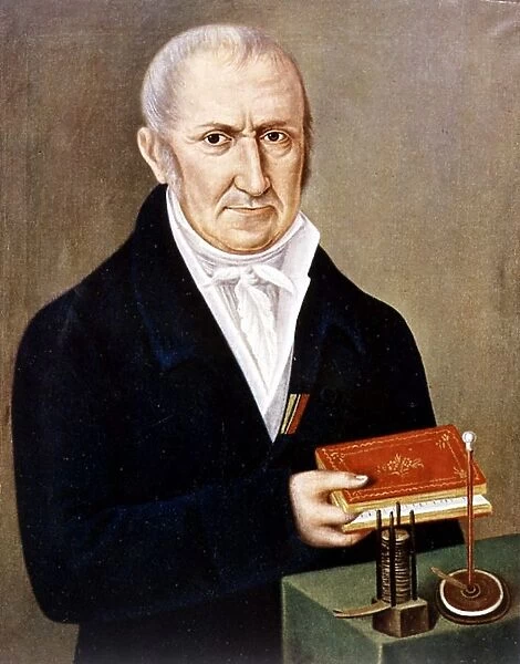 Alessandro Volta (1745-1827) Italian physicist. On table are two of his inventions