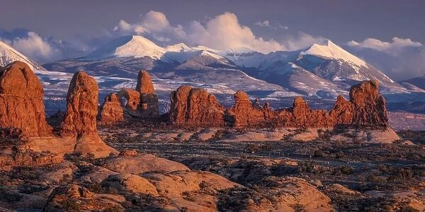 Arches National Park, Utah at sunset with LaSalle snowcapped Mountains in distant view - winter