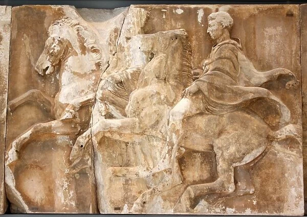 Bas-relief with men on galloping horses