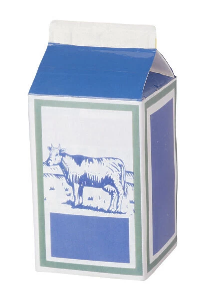 A blue carton of milk with a picture of a cow on its front