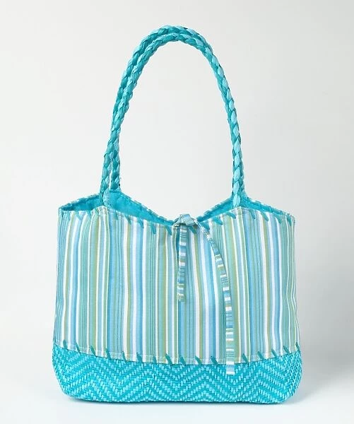 Blue stripy holiday bag with straw handles