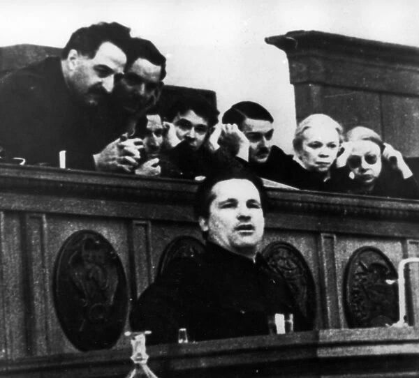 Bolshevik leader sergei mironovich kirov speaking at the 17th congress of the all-union communist party of bolsheviks in february 1934, ordzhonikidze is behind him on the left