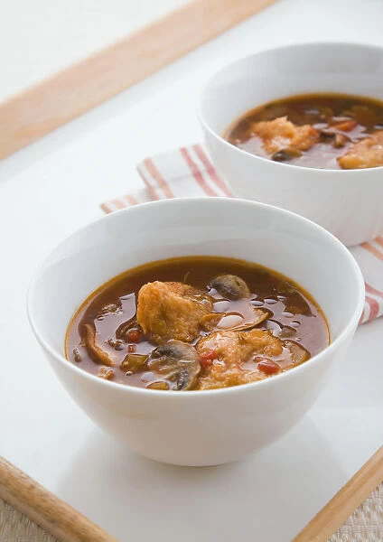 Bowl of porcini mushroom soup, close-up