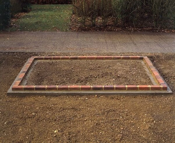 Brick base for a greenhouse