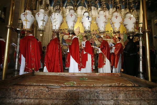 Catholic procession at the Stone of the Anointing. Church of the Holy Sepulchre