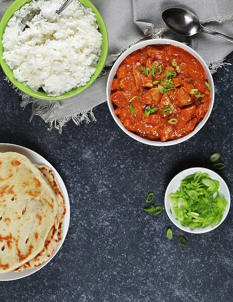 Chicken Tika. chicken. goulash. basmati Rise. background. bowl. bread. butter. butter Chicken. canada. close-up. cooked. cooking. copy Space. crokery. curry. dinner. flatbread. food. food and Drink. fork. freshness. gourmet. healthy Food. homemade