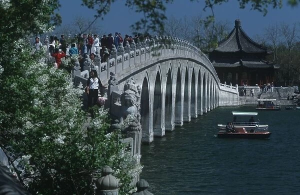 China, Beijing, Fengtai, tourists on Marco Polo Bridge over Kunming Hu lake
