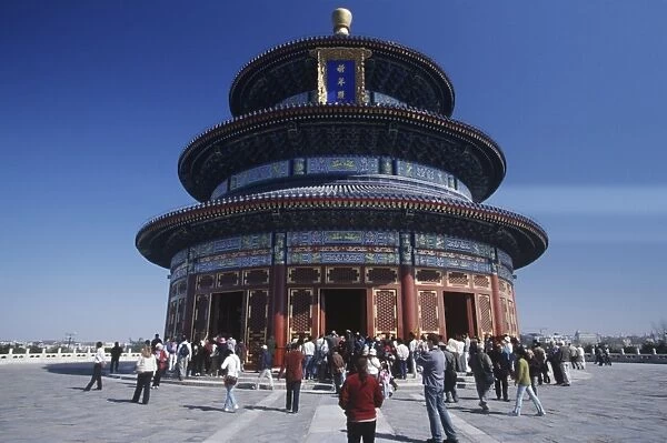 China, Beijing, Tourists at the Hall of Prayer for Good Harvests at Imperial Sacrificial Altar Temple of Heaven