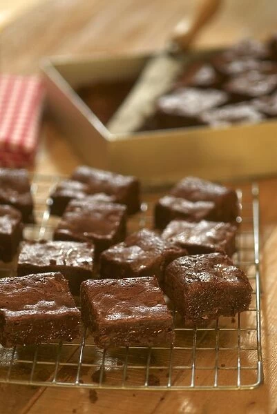 Chocolate brownies cooling on a rack