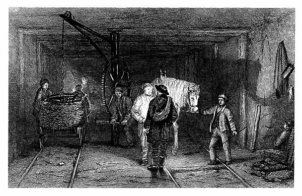 Coal Mining: Underground scene showing full baskets (corves) of coal being loaded