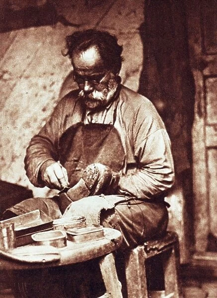 A cobbler in kiev, ukraine, 1928