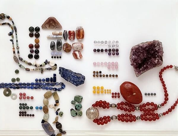 Collection of semi-precious minerals including amethyst, carnelian and lapis lazuli, and semi-precious beads made from quartz, chalcedony, agate, lapis lazuli, turquoise, rhodonite, malachite, garnet