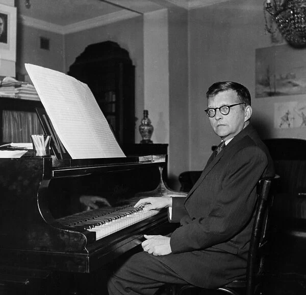 Composer dimitri shostakovich at his piano at home, early 1950s
