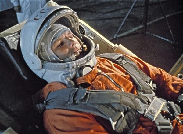 Cosmonaut yuri gagarin during last minute checks of vostok i control systems before launch, 1961