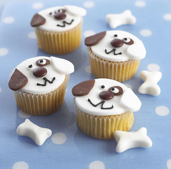 Cupcakes decorated to look like dogs