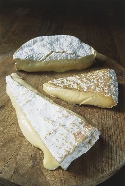 Three different types of ripe French Brie