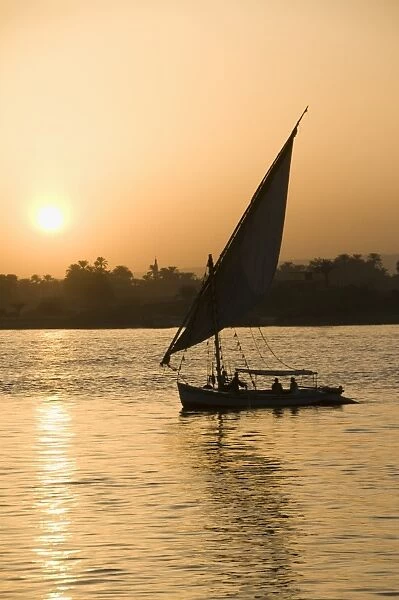 Egypt, Luxor, felucca boat on the River Nile at sunset