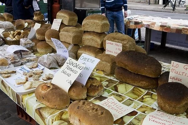 England, Peak District, Ashbourne, loaves on market stall in town