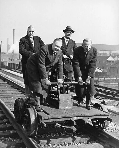 Executives Commute By Handcar