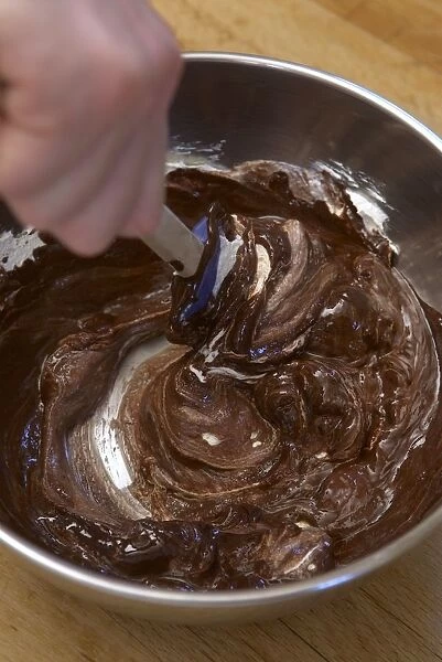 Folding in egg whites to a chocolate and butter mixture