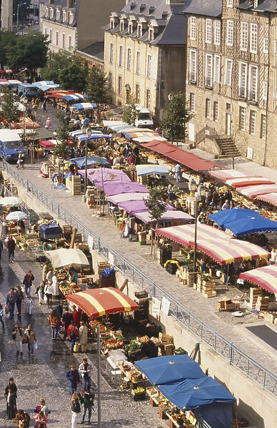 France, Britanny, Place des Lices in Rennes, street lined with colourfully canopied market stalls, elevated view