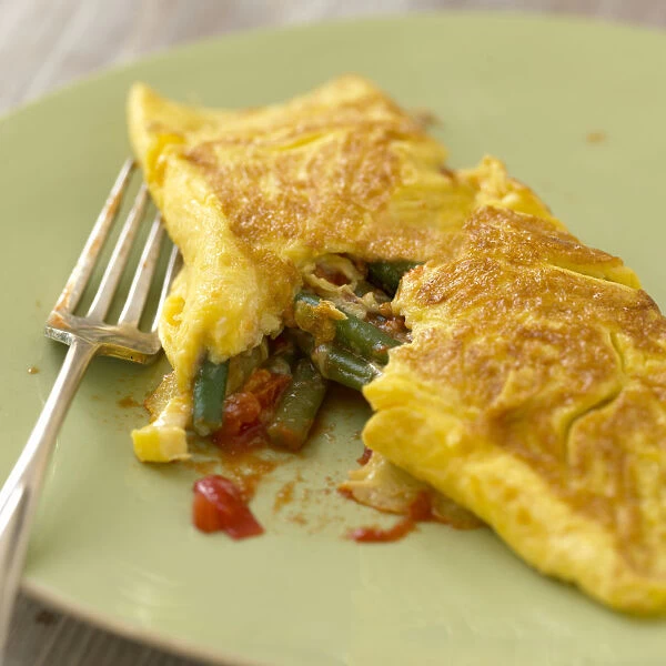 French bean, garlic and tomato omelette