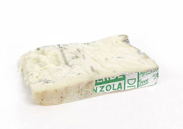 Gorgonzola Dolce blue cheese on white background, close-up